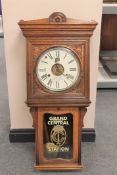 A Victorian carved oak 8 day wall clock, height 99cm.