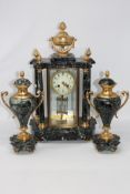 A French marble and gilt metal mounted three-piece striking clock garniture, the clock 50cm high.