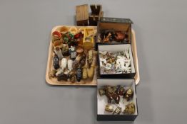 A small collection of Tartan Ware napkin rings, miniature Mauchline ware crib,