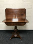 A 19th century inlaid mahogany pedestal tea table, width 86cm.