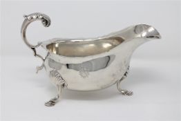 A George II style silver sauceboat, Holland, Aldwinkle & Slater, London 1909, height 11cm, 264g.