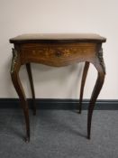 A French rosewood, satinwood inlaid and gilt metal mounted single drawer table, on cabriole legs,