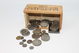 A collection of coins including two £5 coins, silver three pence pieces,