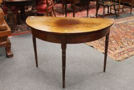 A George III d-shaped mahogany hall table, width 106cm.