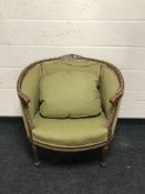 A 19th century carved walnut salon chair, width 82cm.