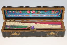 A late 19th/early 20th century Chinese carved ivory and gouache painted hand fan,