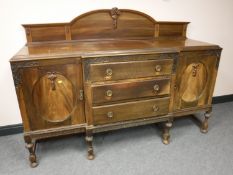An early 20th century mahogany breakfront sideboard, width 184cm.