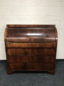 A 19th century mahogany cylinder bureau, fitted four drawers, width 110cm.