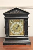 A Victorian oak 8 day chiming bracket clock, height 41cm.