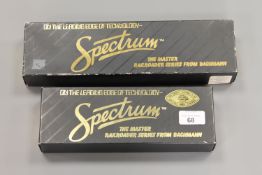 Two Spectrum locomotive engines - 44-ton Great Northern and Union Pacific, all parts boxed.