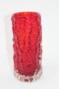 A Whitefriars ruby red textured bark vase, designed by Jeffrey Baxter, height 19cm.