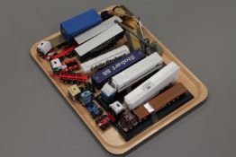 A collection of die-cast vehicles - Commercial wagons and trucks etc.