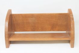 A Robert 'Mouseman' Thompson of Kilburn oak book trough, with carved mouse signature, width 45cm.