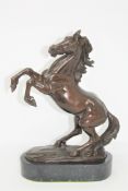 A bronze figure of a rearing stallion after Prosper Lecourtier, on marble base, height 36cm.