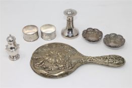 A small group of silver to include two sifters, two napkin rings and a pair of silver salts,