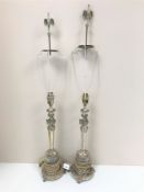 A pair of Egyptian Revival silver plated and cut glass table lamps.