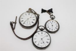 Two silver pocket watches together with a silver fob watch.