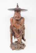 A Chinese carved hardwood figure of a sage, height 46cm.