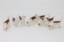 A group of eight Beswick hounds.