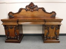 A Victorian mahogany inverted breakfront twin pedestal sideboard, width 212cm.