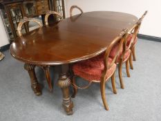 A Victorian mahogany wind out extending dining table with two leaves, length extended 211cm,