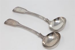 A pair of Victorian Fiddle and Shell pattern silver soup spoons, Charles Lias, London 1840,