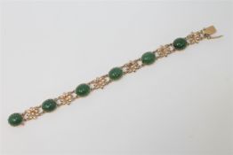 A 9ct gold nephrite bracelet, length 17.