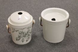 Two antique slop pails, decorated with flowers.