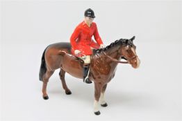 A Beswick Huntsman 1501, style 2 standing, brown.