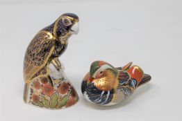 A Royal Crown Derby Bronze Winged Parrot paperweight, gold stopper,