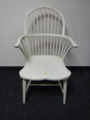 A 19th century style painted Windsor style chair, width 54cm.