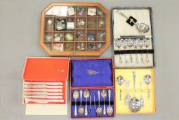 A jewellery display box containing a quantity of costume jewellery, brooches, earrings etc,