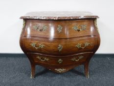 A 19th century style inlaid walnut and ormolu mounted marble toped three drawer bombe chest,