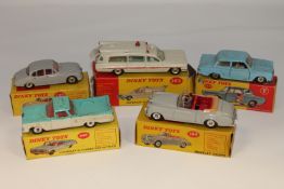 Five Dinky Toys die cast vehicles - Bentley Coupe 194, Superior Criterion Ambulance 263,