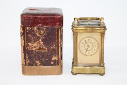 An early twentieth century French striking and repeating gilt brass carriage clock,