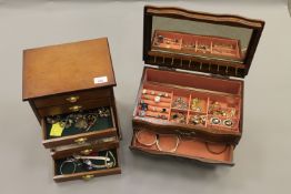 Two jewellery chests containing a collection of costume jewellery; rings, necklaces, earrings etc.