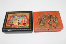 A Russian hand painted and lacquered trinket box, together with another Japanese example.
