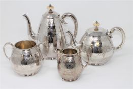 A good quality silver plated four piece tea service by Elkington & Co, the water jug 23cm high.
