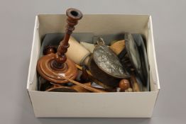 A box containing an interesting collection of wooden collectables, pairs of glove stretchers,