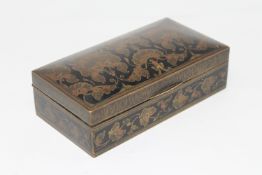 An Indian hand painted brass trinket box.
