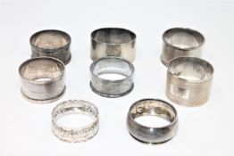 Eight silver napkin rings, 160.4g.