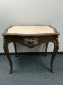 A good quality French ormolu mounted centre table with inset rouge marble top.
