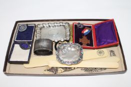 A silver napkin ring, together with an antique Chinese ivory letter opener, silver pin dish,