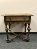 A William and Mary style oak side table fitted with a drawer, width 68 cm.