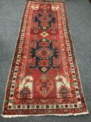 A Persian Sarab runner 298 cm x 116 cm.