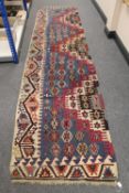 An unusual old kilim runner, of geometric design.