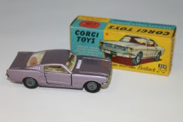 A Corgi Toys die cast vehicle - Ford Mustang Fastback 2 + 2, 320, boxed.