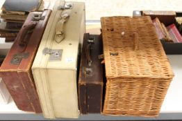 An early 20th century pig skin suitcase,