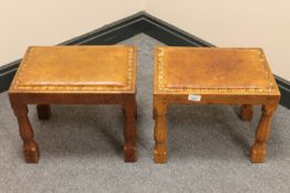 A pair of Albert 'Eagleman' Jeffray oak and studded leather footstools, with carved eagle signature,