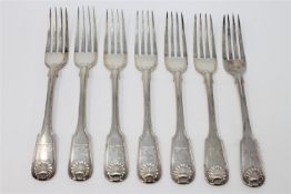 A set of seven George IV Fiddle and Shell pattern silver table forks, George Samuel Lewis,